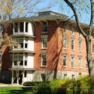 Exterior of Van Vleck Residence Hall from the Pine Grove