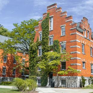 Close up of exterior of the back of Voorhees Residence Hall from the Pine Grove