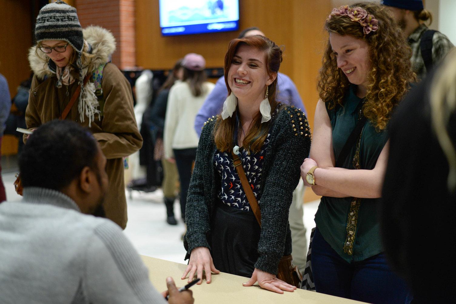 Students with Jamaal May at book signing